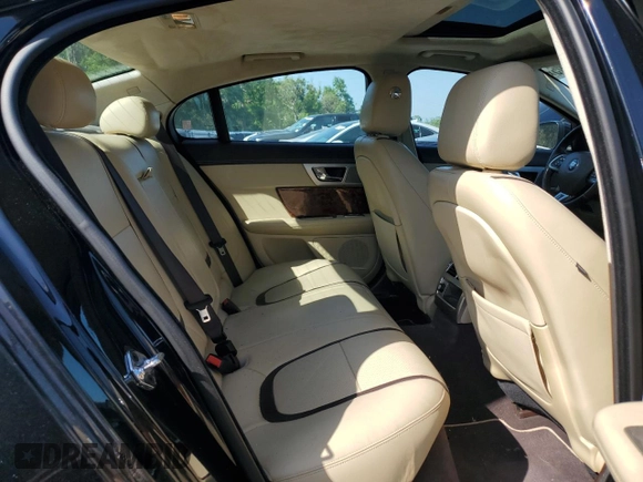 2015 Jaguar XF V6 Portfolio with VIN SAJWJ0FFXF8U60040, listed as a Copart auction lot 52912695 with 112,618 mi miles and Salvage Title. Bid and sale history available at carsss.com. Image 10.