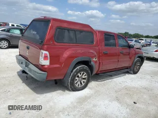 2008 Mitsubishi Raider LS z VIN 1Z7HC28K58S588087, wystawiony jako Copart lot #72013544 z przebiegiem 164 134 mil mil oraz Nie do naprawy • Non repairable. Historia ofert i sprzedaży dostępna na DreamBid. Obrazek 3.