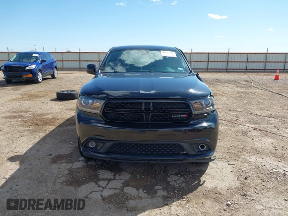 2016 Dodge Durango SXT with VIN 1C4RDHAG9GC394516, listed as a IAAI auction lot 41752361 with 124,762 mi miles and . Bid and sale history available at DreamBid. Image 13.
