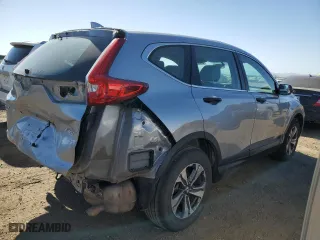 2018 Honda CR-V LX with VIN 2HKRW6H35JH210704, listed as a Copart auction lot 47471065 with 104,928 mi miles and Salvage Title. Bid and sale history available at carsss.com. Image 3.