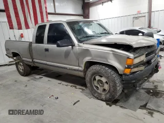 1998 Chevrolet Silverado 1500 with VIN 2GCEK19R9W1105382, listed as a Copart auction lot 87264814 with 290,006 mi miles and Salvage Title. Bid and sale history available at DreamBid. Image 4.