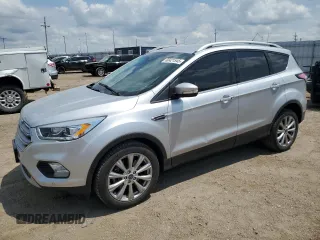 2018 Ford Escape Titanium with VIN 1FMCU9J99JUC89677, listed as a Copart auction lot 60421545 with 98,021 mi miles and Salvage title. Bid and sale history available at DreamBid. Image 1.