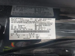 2013 Ford Focus SE with VIN 1FADP3F25DL209199, listed as a IAAI auction lot 42086573 with 136,999 mi miles. Bid and sale history available at carsss.com. Image 9.
