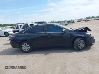 2015 Toyota Camry XLE with VIN 4T1BF1FK7FU037419, listed as a IAAI auction lot 42053259 with 118,453 mi miles and . Bid and sale history available at DreamBid. Image 13.