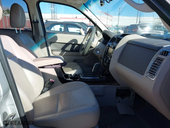 2009 Ford Escape Hybrid with VIN 1FMCU49389KA14781, listed as a IAAI auction lot 41409142 with 155,728 mi miles. Bid and sale history available at carsss.com. Image 5.