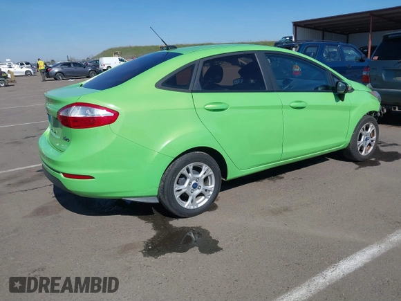2015 Ford Fiesta SE with VIN 3FADP4BJ7FM211041, listed as a IAAI auction lot 41625903 with 135,532 mi miles. Bid and sale history available at carsss.com. Image 4.