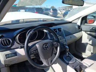 2010 Mazda CX-7 Touring with VIN JM3ER4W3XA0338678, listed as a IAAI auction lot 41642192 with 158,321 mi miles. Bid and sale history available at carsss.com. Image 13.