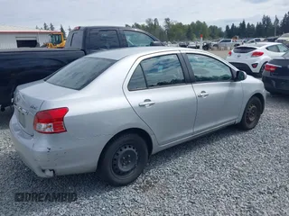 2009 Toyota Yaris with VIN JTDBT903391322248, listed as a IAAI auction lot 40112165 with 193,625 mi miles. Bid and sale history available at carsss.com. Image 4.