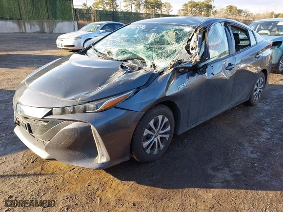 2021 Toyota Prius Prime LE with VIN JTDKAMFP1M3183950, listed as a IAAI auction lot 41526295 with 69,727 mi miles. Bid and sale history available at carsss.com. Image 2.
