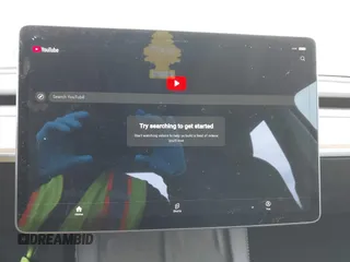 2022 Tesla Model Y Long Range z VIN 7SAYGDEE7NF389788, wystawiony jako IAAI lot #42014111 z przebiegiem 37 606 mil mil oraz . Historia ofert i sprzedaży dostępna na DreamBid. Obrazek 17.