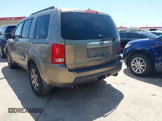2011 Honda Pilot Touring with VIN 5FNYF4H94BB021952, listed as a IAAI auction lot 41985940 with 170,043 mi miles. Bid and sale history available at carsss.com. Image 3.
