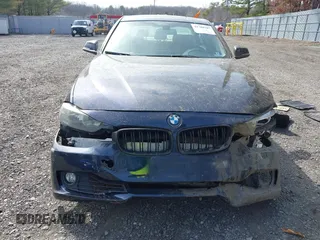 2013 BMW 3 Series 328i xDrive with VIN WBA3B5G59DNS01455, listed as a IAAI auction lot 41788947 with 127,677 mi miles. Bid and sale history available at carsss.com. Image 12.