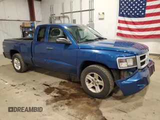 2011 Ram Dakota Bighorn/Lonestar with VIN 1D7RW3BK8BS670446, listed as a Copart auction lot 87371804 with 104,376 mi miles and Salvage Title. Bid and sale history available at carsss.com. Image 4.