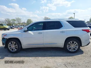 2018 Chevrolet Traverse High Country with VIN 1GNEVKKW9JJ111962, listed as a IAAI auction lot 42118324 with 104,311 mi miles and . Bid and sale history available at DreamBid. Image 15.