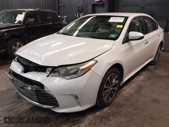 2016 Toyota Avalon Limited with VIN 4T1BK1EB8GU216020, listed as a IAAI auction lot 42050754 with 160,609 mi miles and . Bid and sale history available at DreamBid. Image 2.