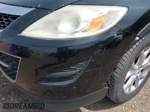 2012 Mazda CX-9 Touring with VIN JM3TB2CAXC0343367, listed as a IAAI auction lot 42022285 with 213,393 mi miles and . Bid and sale history available at DreamBid. Image 6.