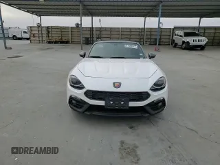 2019 FIAT 124 Spider Urbana Edition z VIN JC1NFAEK2K0142905, wystawiony jako Copart lot #87458644 z przebiegiem 33 680 mil mil oraz Szkoda całkowita • Salvage title. Historia ofert i sprzedaży dostępna na DreamBid. Obrazek 11.