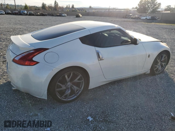 2014 Nissan 370Z Touring with VIN JN1AZ4EH7EM637101, listed as a Copart auction lot 41339705 with 105,841 mi miles and Salvage Title. Bid and sale history available at carsss.com. Image 3.