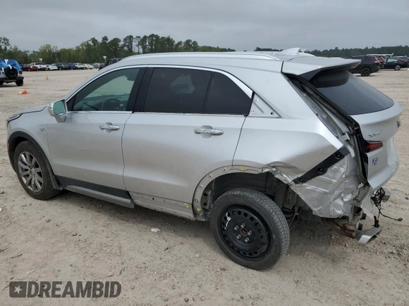 2021 Cadillac XT4 FWD Premium Luxury with VIN 1GYFZCR41MF002411, listed as a Copart auction lot 49746855 with 81,938 mi miles and Salvage title. Bid and sale history available at DreamBid. Image 2.