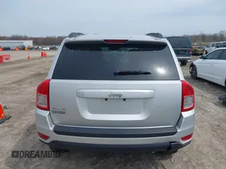2012 Jeep Compass Sport with VIN 1C4NJDBB4CD624163, listed as a IAAI auction lot 42025783 with 148,928 mi miles. Bid and sale history available at carsss.com. Image 16.