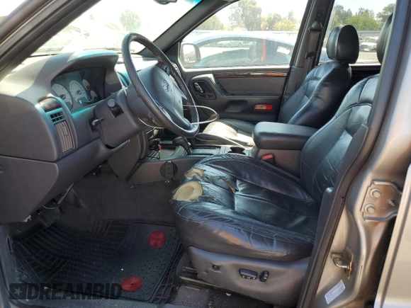 2001 Jeep Grand Cherokee Limited with VIN 1J4GW58S61C565685, listed as a Copart auction lot 73168374 with 252,978 mi miles and Clean Title. Bid and sale history available at carsss.com. Image 7.