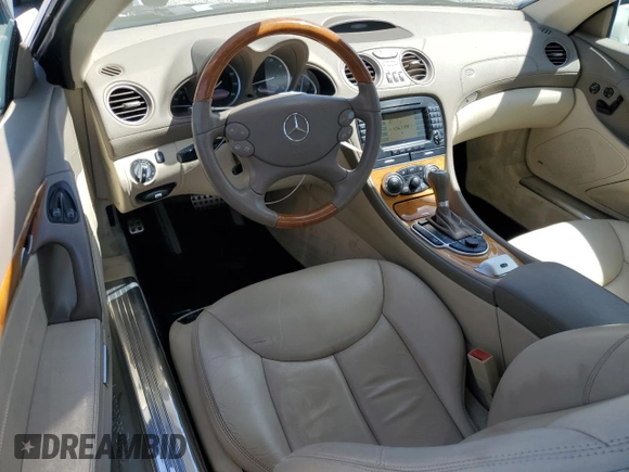 2008 Mercedes-Benz SL 550 with VIN WDBSK71FX8F141776, listed as a Copart auction lot 50004185 with 58,668 mi miles and Salvage title. Bid and sale history available at DreamBid. Image 8.