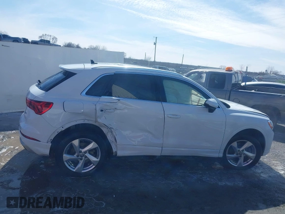 2020 Audi Q3 Premium with VIN WA1AECF31L1098425, listed as a IAAI auction lot 41640806 with 100,462 mi miles and . Bid and sale history available at DreamBid. Image 13.
