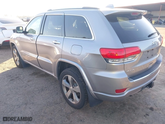 2014 Jeep Grand Cherokee Overland with VIN 1C4RJFCGXEC162238, listed as a IAAI auction lot 41291512 with 88,261 mi miles. Bid and sale history available at carsss.com. Image 3.