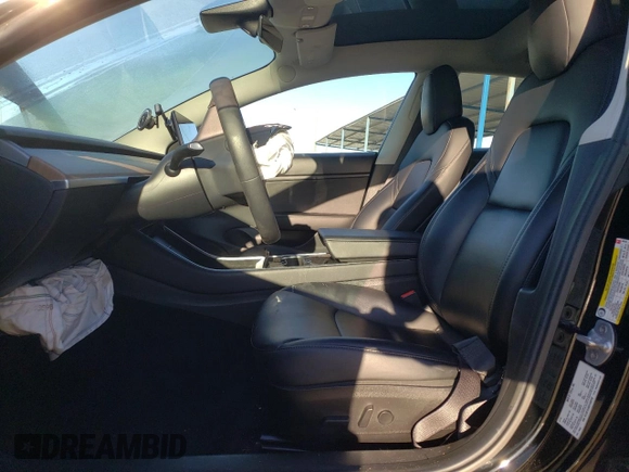 2019 Tesla Model 3 Mid Range with VIN 5YJ3E1EA6KF436152, listed as a Copart auction lot 50399265 with 62,676 mi miles and Salvage Title. Bid and sale history available at DreamBid. Image 7.