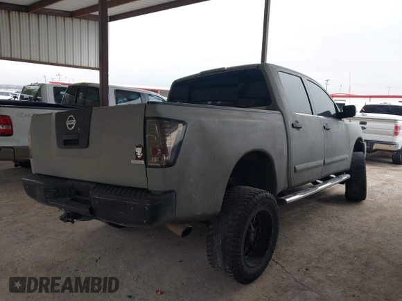 2008 Nissan Titan XE with VIN 1N6BA07DX8N339911, listed as a IAAI auction lot 41539937 with 242,659 mi miles. Bid and sale history available at carsss.com. Image 4.