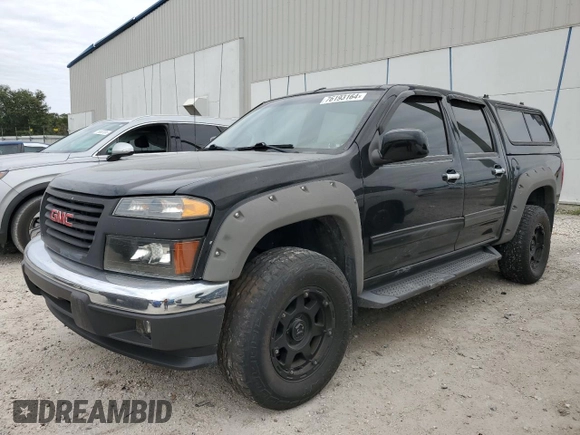 2010 GMC Canyon SLE1 with VIN 1GTJTCDE0A8136926, listed as a Copart auction lot 76193164 with 214,608 mi miles and Salvage title. Bid and sale history available at DreamBid. Image 1.