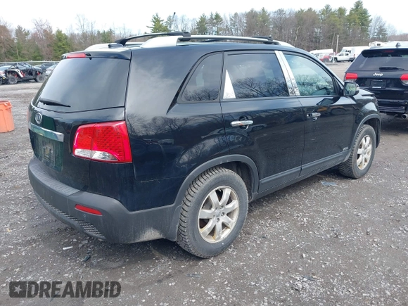 2012 Kia Sorento LX with VIN 5XYKTDA64CG259082, listed as a IAAI auction lot 42012153 with 162,383 mi miles. Bid and sale history available at carsss.com. Image 4.
