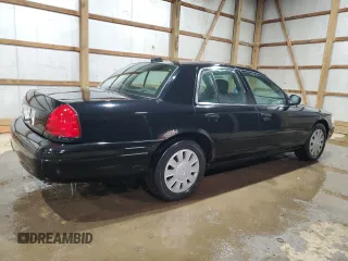 2006 Ford Police Interceptor with VIN 2FAFP71W16X144089, listed as a Copart auction lot 44249135 with 203,859 mi miles and Clean title. Bid and sale history available at DreamBid. Image 3.