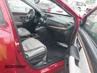2021 Honda CR-V Touring with VIN 2HKRW2H9XMH663315, listed as a IAAI auction lot 42188893 with 26,203 mi miles and . Bid and sale history available at DreamBid. Image 5.