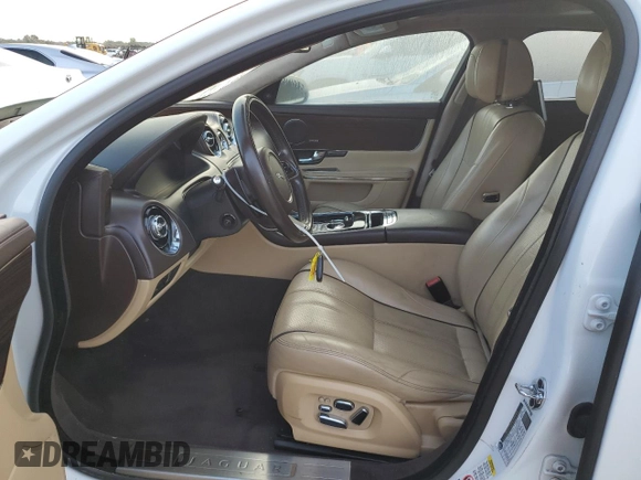 2013 Jaguar XJ with VIN SAJWA2GB3DLV52351, listed as a Copart auction lot 73343244 with 78,522 mi miles and Salvage Title. Bid and sale history available at carsss.com. Image 7.