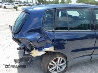 2013 Volkswagen Tiguan S with VIN WVGAV3AX5DW620778, listed as a IAAI auction lot 42505171 with 178,399 mi miles and . Bid and sale history available at DreamBid. Image 13.