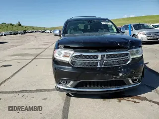2016 Dodge Durango Citadel with VIN 1C4RDJEG6GC341421, listed as a Copart auction lot 61680215 with 77,024 mi miles and Salvage title. Bid and sale history available at DreamBid. Image 14.