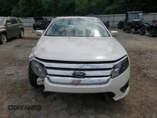 2012 Ford Fusion Hybrid с VIN 3FADP0L35CR184476, выставлен на аукционе Copart как лот 63907885 с пробегом 230 589 миль миль и Списание • Salvage title. История ставок и продаж доступна на DreamBid. Изображение 5.