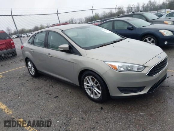 2015 Ford Focus SE with VIN 1FADP3F21FL376579, listed as a IAAI auction lot 41972088 with 129,593 mi miles. Bid and sale history available at carsss.com. Image 1.