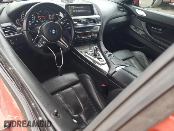 2014 BMW M6 z VIN WBSLX9C52ED160071, wystawiony jako Copart lot #77452554 z przebiegiem 64 814 mil mil oraz Szkoda całkowita • Salvage title. Historia ofert i sprzedaży dostępna na DreamBid. Obrazek 8.