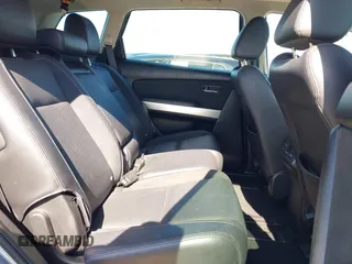 2014 Mazda CX-9 Grand Touring z VIN JM3TB3DV9E0437380, wystawiony jako IAAI lot #42298066 z przebiegiem 169 644 mil mil oraz . Historia ofert i sprzedaży dostępna na DreamBid. Obrazek 8.