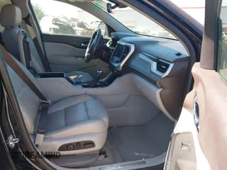 2017 GMC Acadia SLT with VIN 1GKKNMLS6HZ136546, listed as a IAAI auction lot 41664363 with 234,625 mi miles. Bid and sale history available at carsss.com. Image 5.