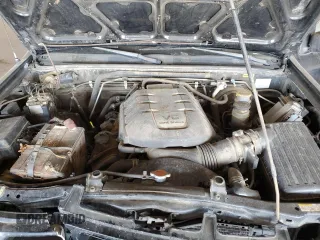 2001 Isuzu Rodeo S with VIN 4S2CK58W614344850, listed as a Copart auction lot 63807664 with 176,203 mi miles and Salvage title. Bid and sale history available at DreamBid. Image 11.