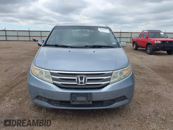 2011 Honda Odyssey EX-L with VIN 5FNRL5H64BB085479, listed as a IAAI auction lot 42404637 with 185,624 mi miles and . Bid and sale history available at DreamBid. Image 12.