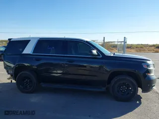 2020 Chevrolet Tahoe Commercial with VIN 1GNLCDEC4LR183215, listed as a IAAI auction lot 40783993 with 119,705 mi miles. Bid and sale history available at carsss.com. Image 13.