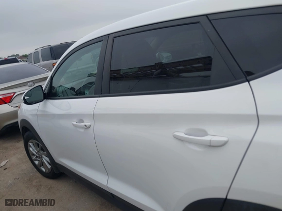 2016 Hyundai Tucson SE with VIN KM8J23A4XGU238521, listed as a IAAI auction lot 41886259 with 126,974 mi miles. Bid and sale history available at carsss.com. Image 14.