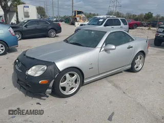 1999 Mercedes-Benz SLK 230/320 with VIN WDBKK47F1XF086736, listed as a IAAI auction lot 41580240 with 56,822 mi miles and . Bid and sale history available at DreamBid. Image 2.