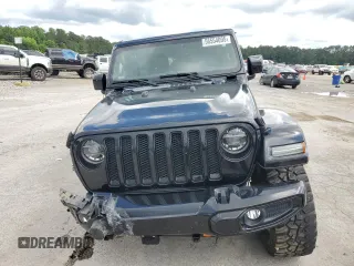2020 Jeep Wrangler Unlimited Sahara High Altitude with VIN 1C4HJXEG1LW324669, listed as a Copart auction lot 56554095 with 42,098 mi miles and Salvage title. Bid and sale history available at DreamBid. Image 5.