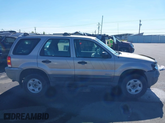 2001 Ford Escape XLS с VIN 1FMYU01B11KA16460, выставлен на аукционе IAAI как лот 42346546 с пробегом 264 160 миль миль и . История ставок и продаж доступна на DreamBid. Изображение 13.
