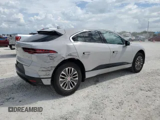 2020 Jaguar I-Pace S z VIN SADHB2S11L1F79827, wystawiony jako Copart lot #67373213 z przebiegiem 8198 mil mil oraz . Historia ofert i sprzedaży dostępna na DreamBid. Obrazek 3.